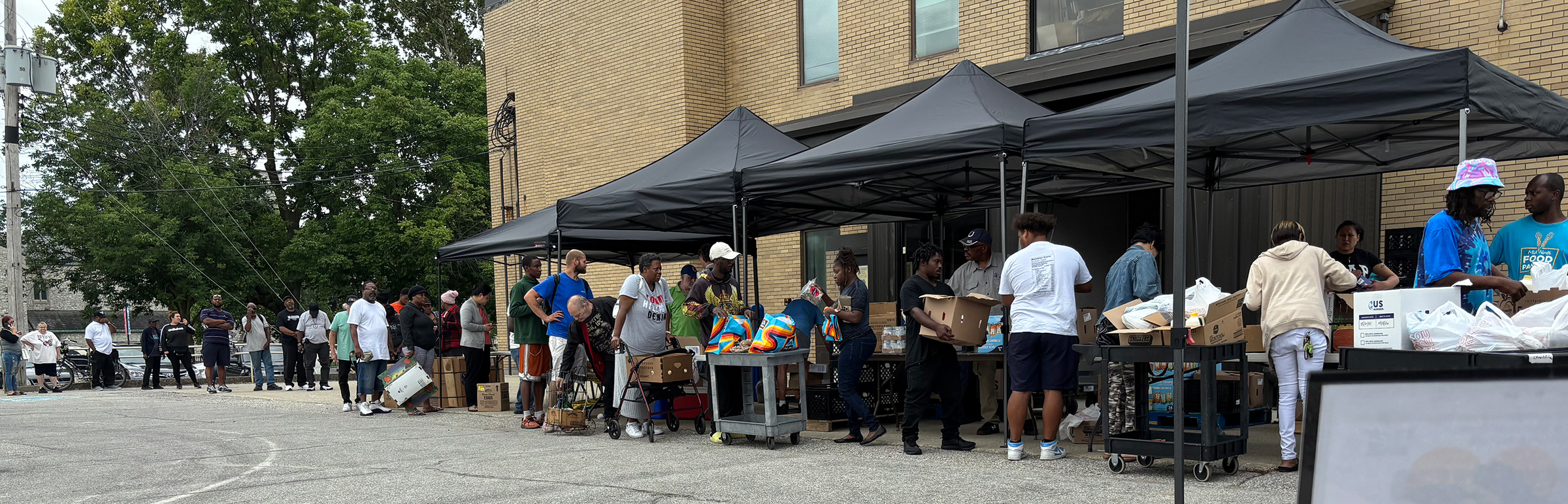 Line of people outside of Mid-North Food Pantry